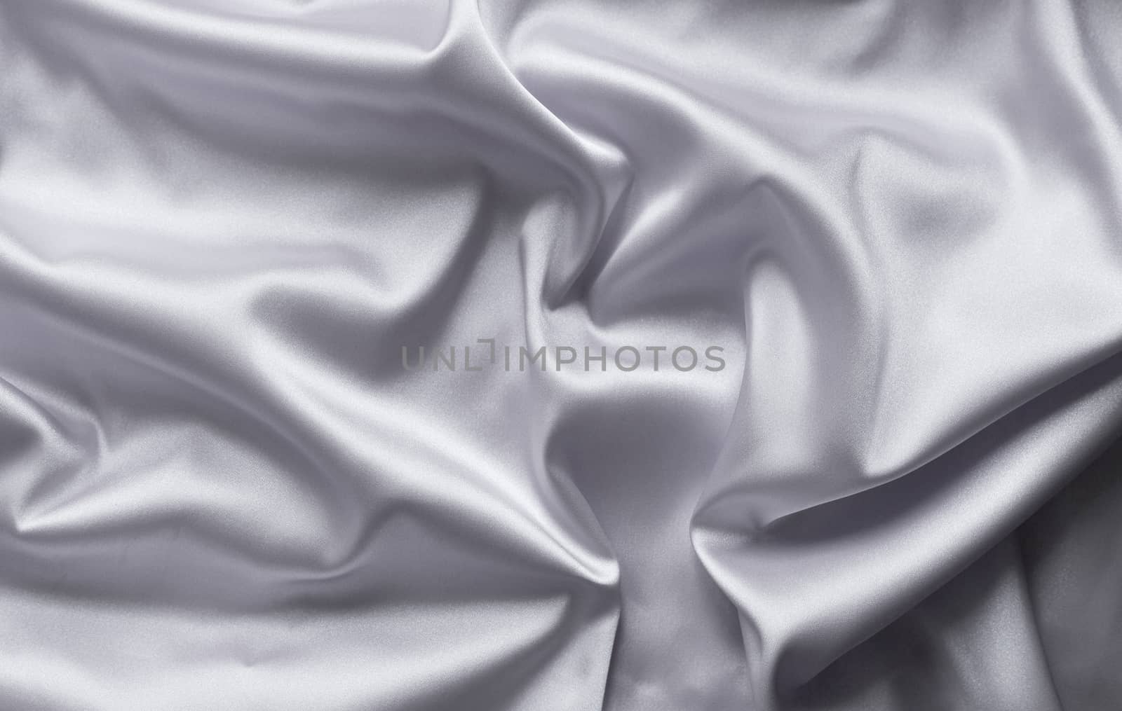 Smooth elegant gray silk with soft folds can be used as background by galinasharapova