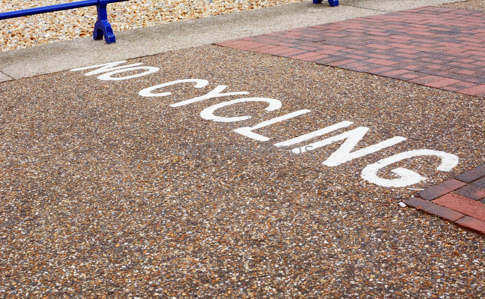 No Cycling instruction painted across a pedestrian pavement in the seaside town of Eastbourne, East Sussex