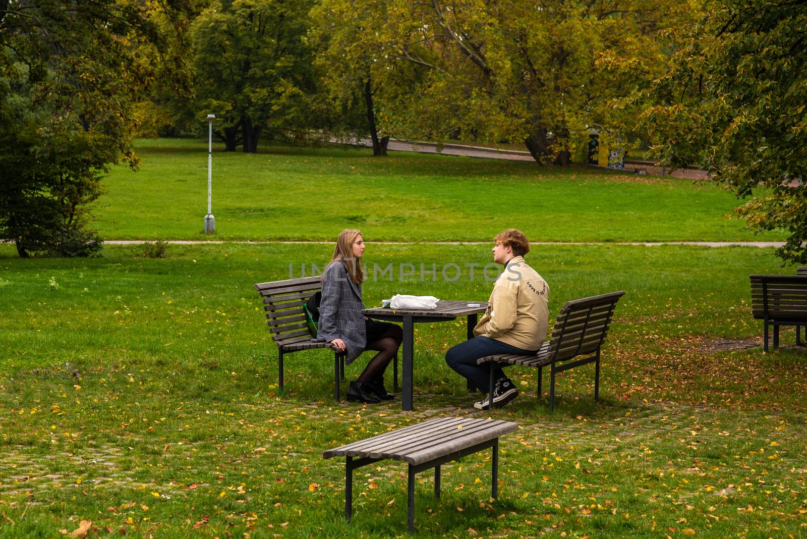 11/05/2020. Prague, Czech Republic. Man and woman are talking on Letna Park in Autumn 2020 on Prague 6 during quarantine period due to outbreak of COVID-19 as winter is starting, Czech Republic by gonzalobell