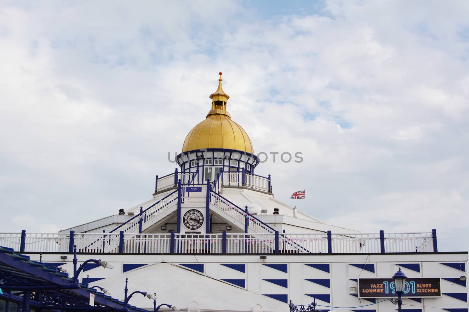 Tower with gold dome at the end of Eastbourne pleasure pier by sarahdoow