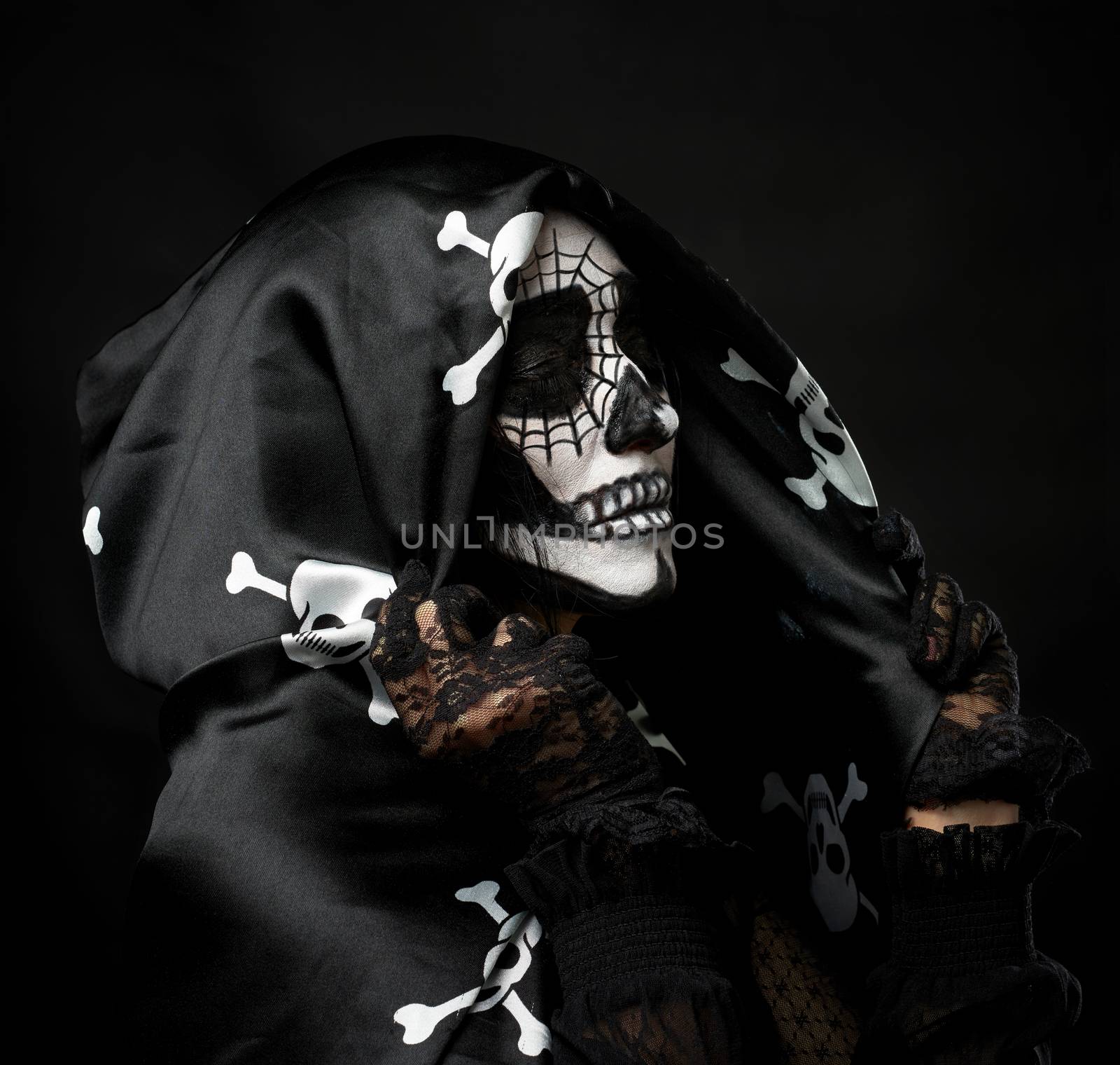 portrait of a woman in a make-up of a skeleton dressed in a blac by ndanko