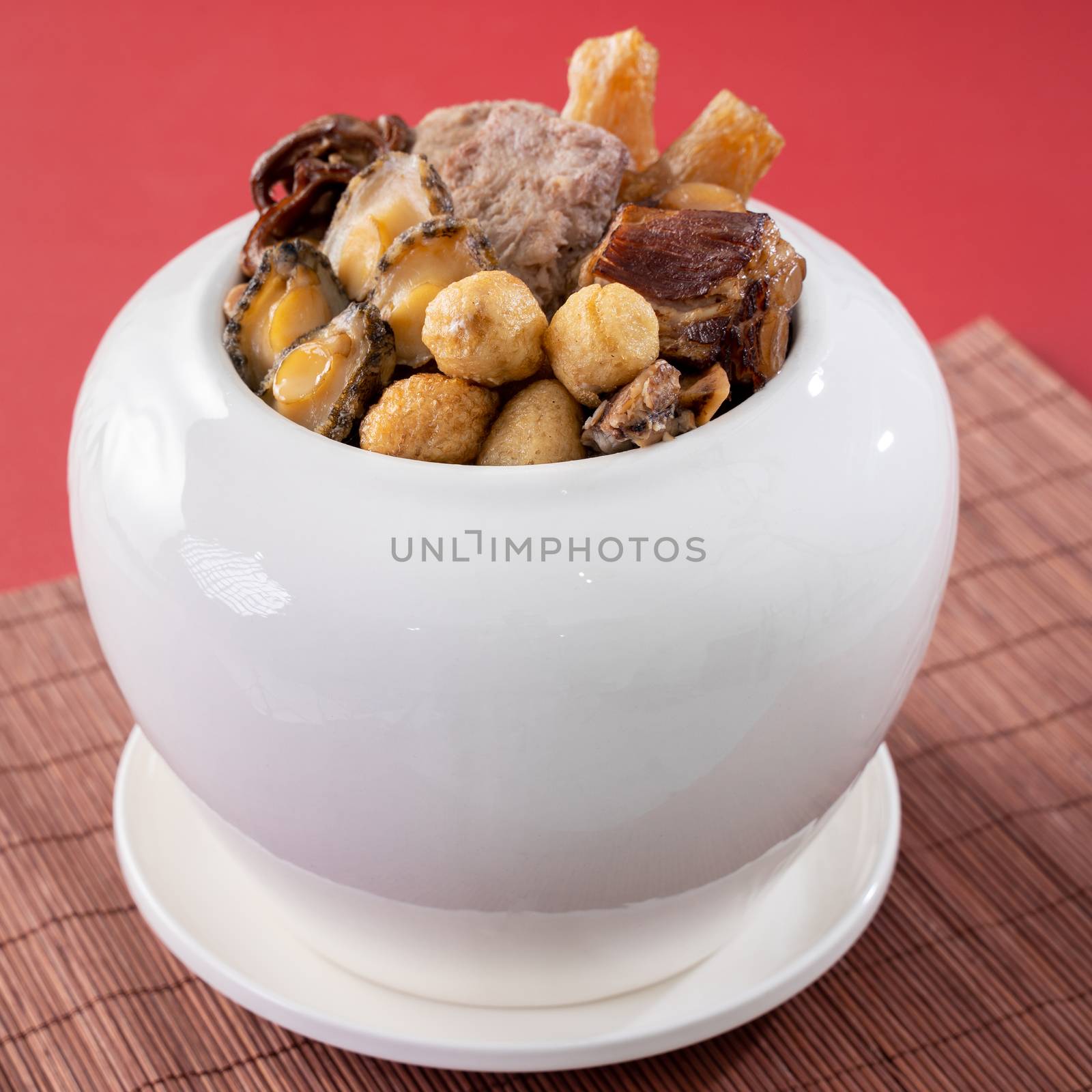 Traditional food of Chinese lunar new year, Buddha jumps over the wall, Chinese Soup Casserole dish, Buddha's Temptation, named Fo Tiao Qiang, close up.