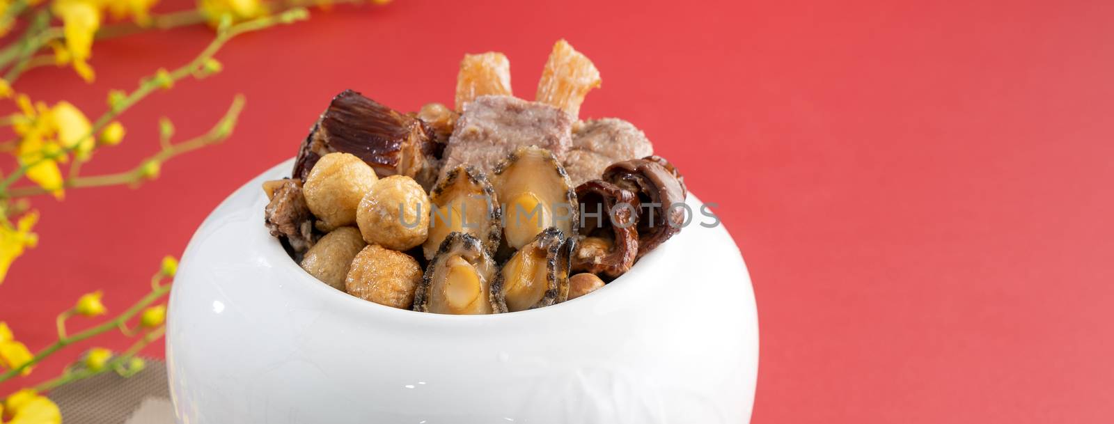 Traditional food of Chinese lunar new year, Buddha jumps over the wall, Chinese Soup Casserole dish, Buddha's Temptation, named Fo Tiao Qiang, close up.