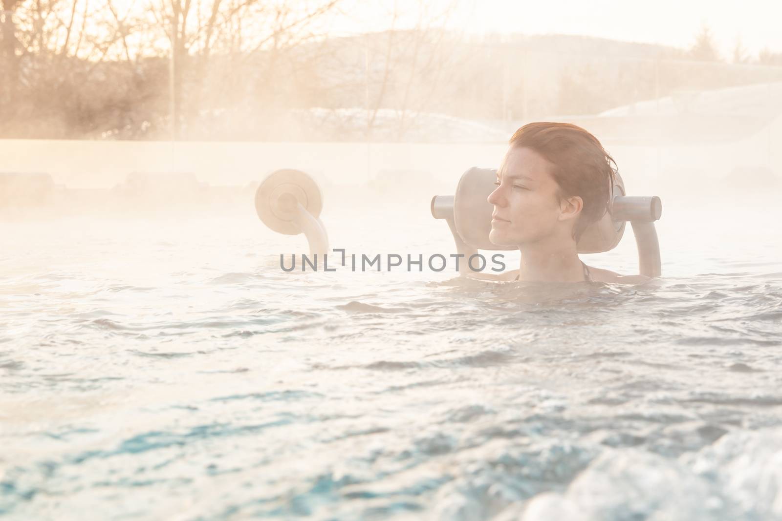 relax in the winter whirlpool in the wellness by Edophoto