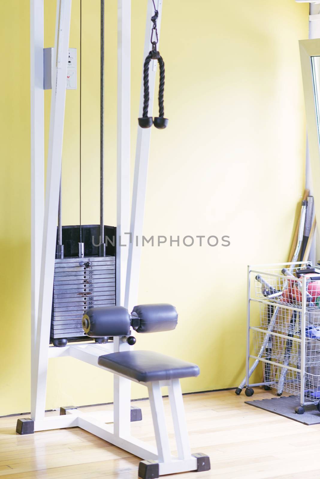 Close up view of a handle of a hand pull machine in a modern fitness center. Gym equipment