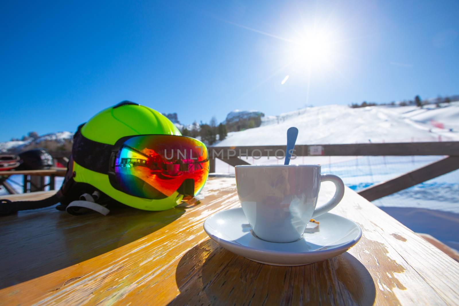 Cappuccino coffee in cafe at ski resort by destillat