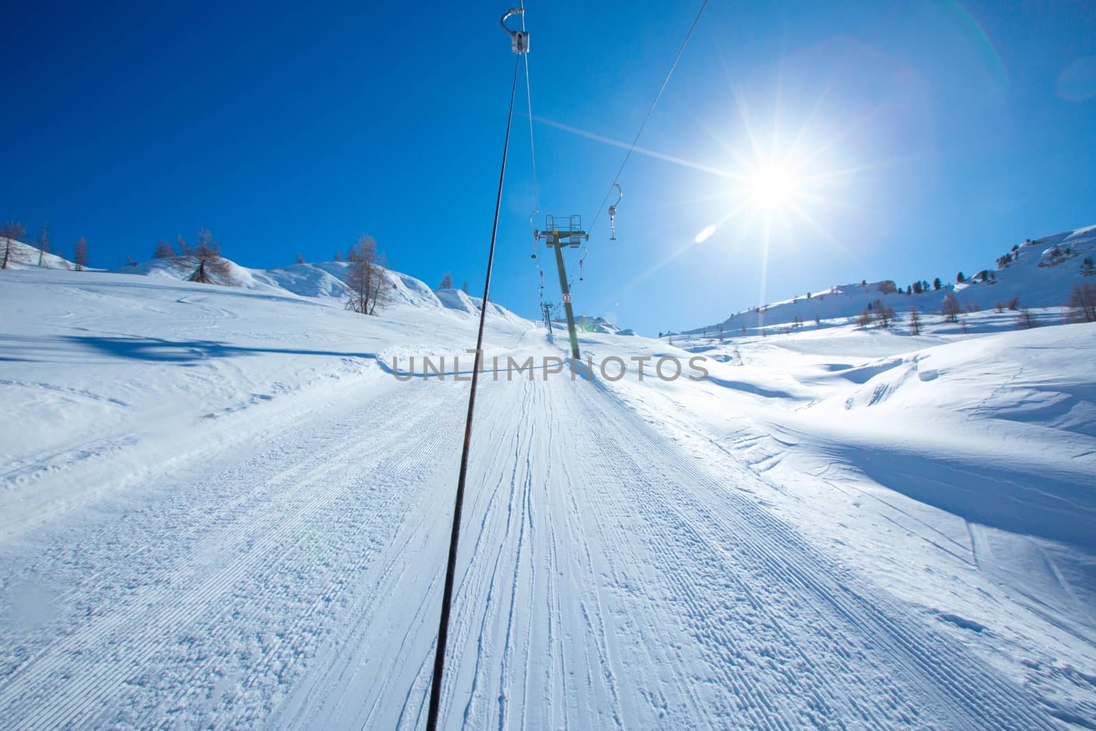 T bar ski lift for pulling skiers up the slope. Perfect winter landscape in European Alps Italy Cortina d'Ampezzo Col Gallina