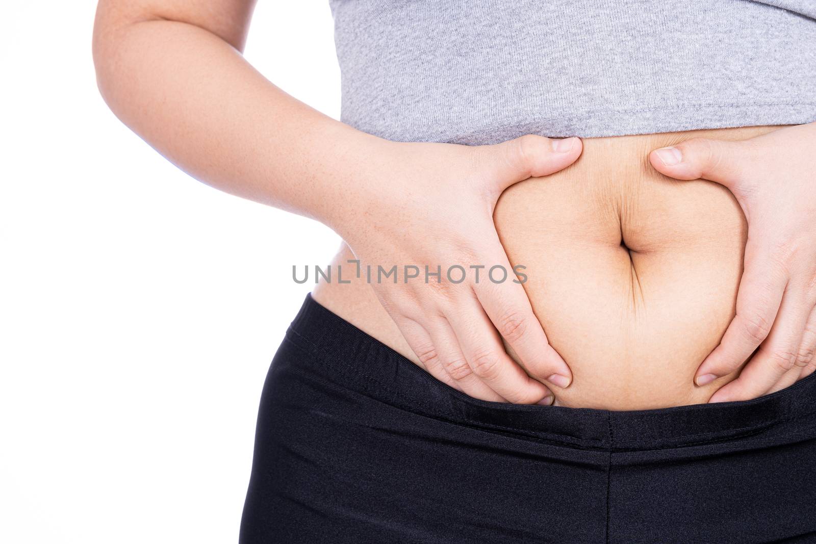 Fat woman holding excessive fat belly, overweight fatty belly isolated on over white background. Diet lifestyle, weight loss, stomach muscle, healthy concept.