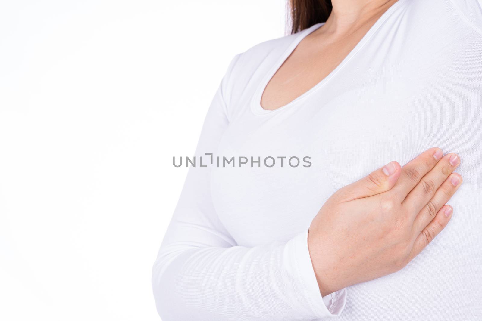 Woman hands doing breast self exam for checking lumps and signs of breast cancer isolated over white background. Medical, healthcare for advertising concept.