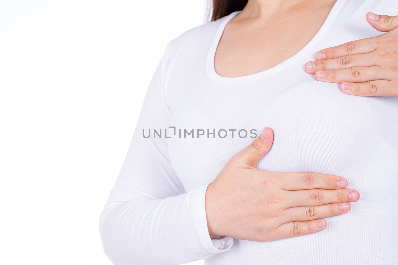 Woman hands doing breast self exam for checking lumps and signs of breast cancer isolated over white background. Medical, healthcare for advertising concept.