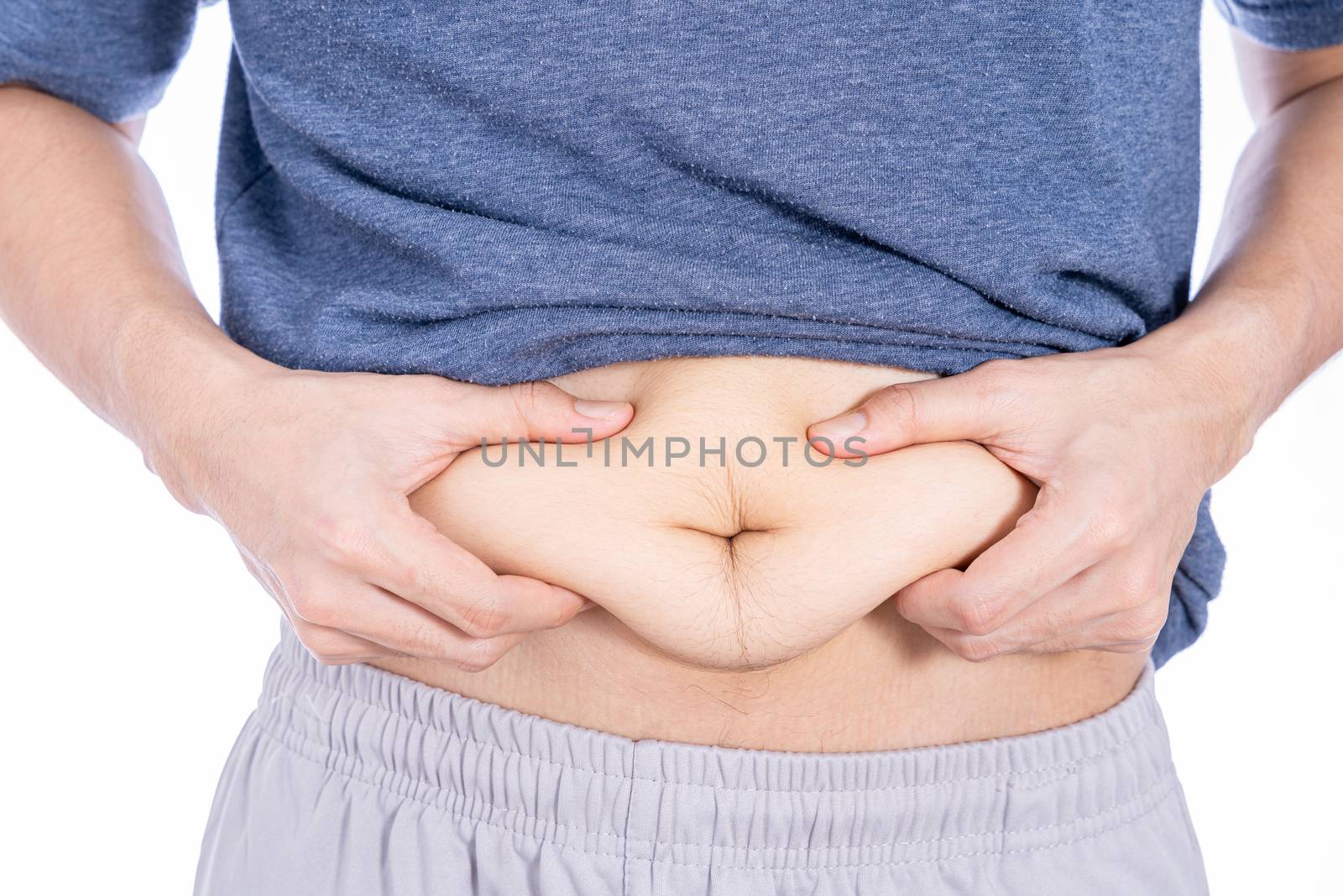 Fat man holding excessive fat belly, overweight fatty belly isolated white background. Diet lifestyle, weight loss, stomach muscle, healthy concept.