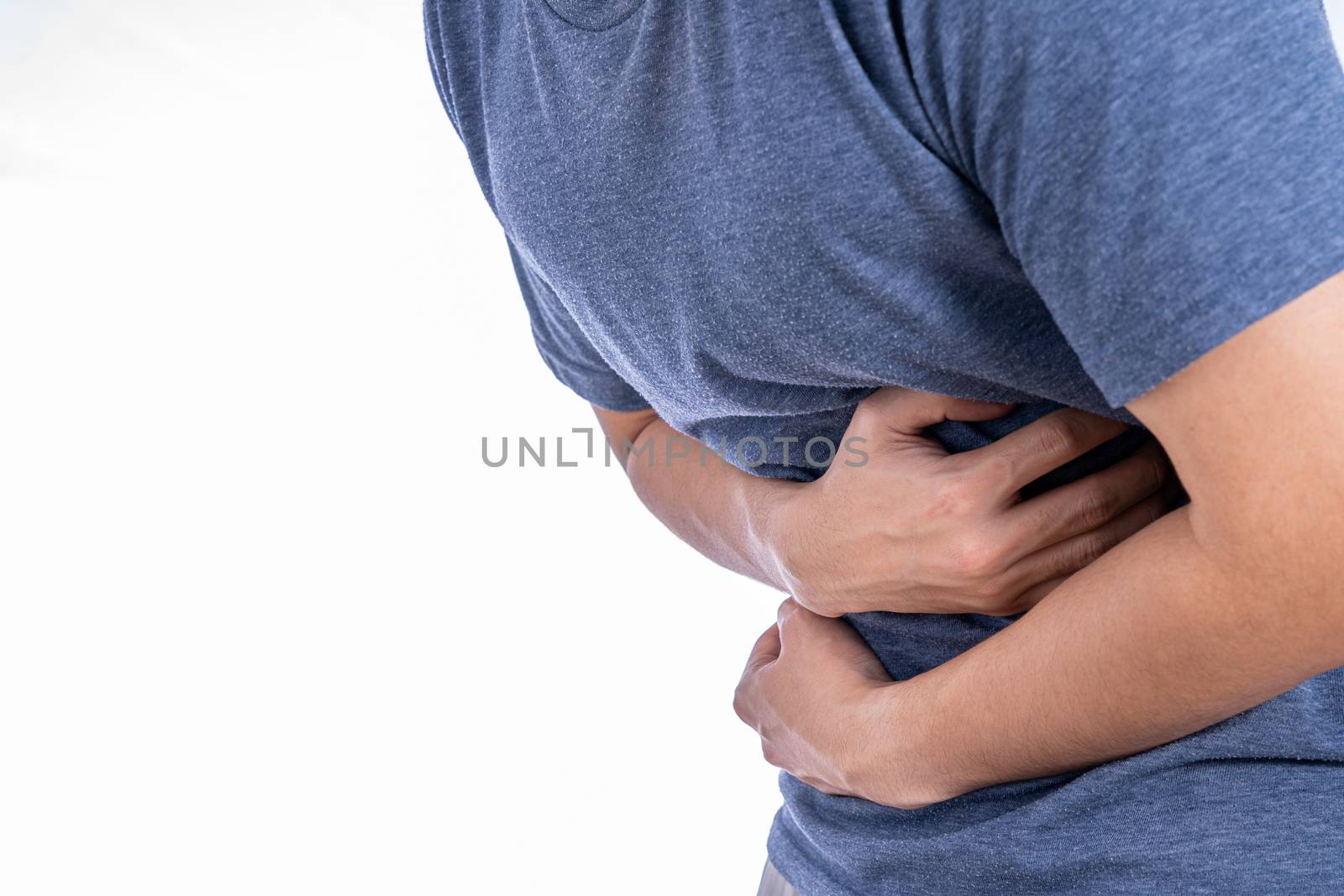 Man suffering from stomach pain and injury isolated white background. Health care and medical concept.