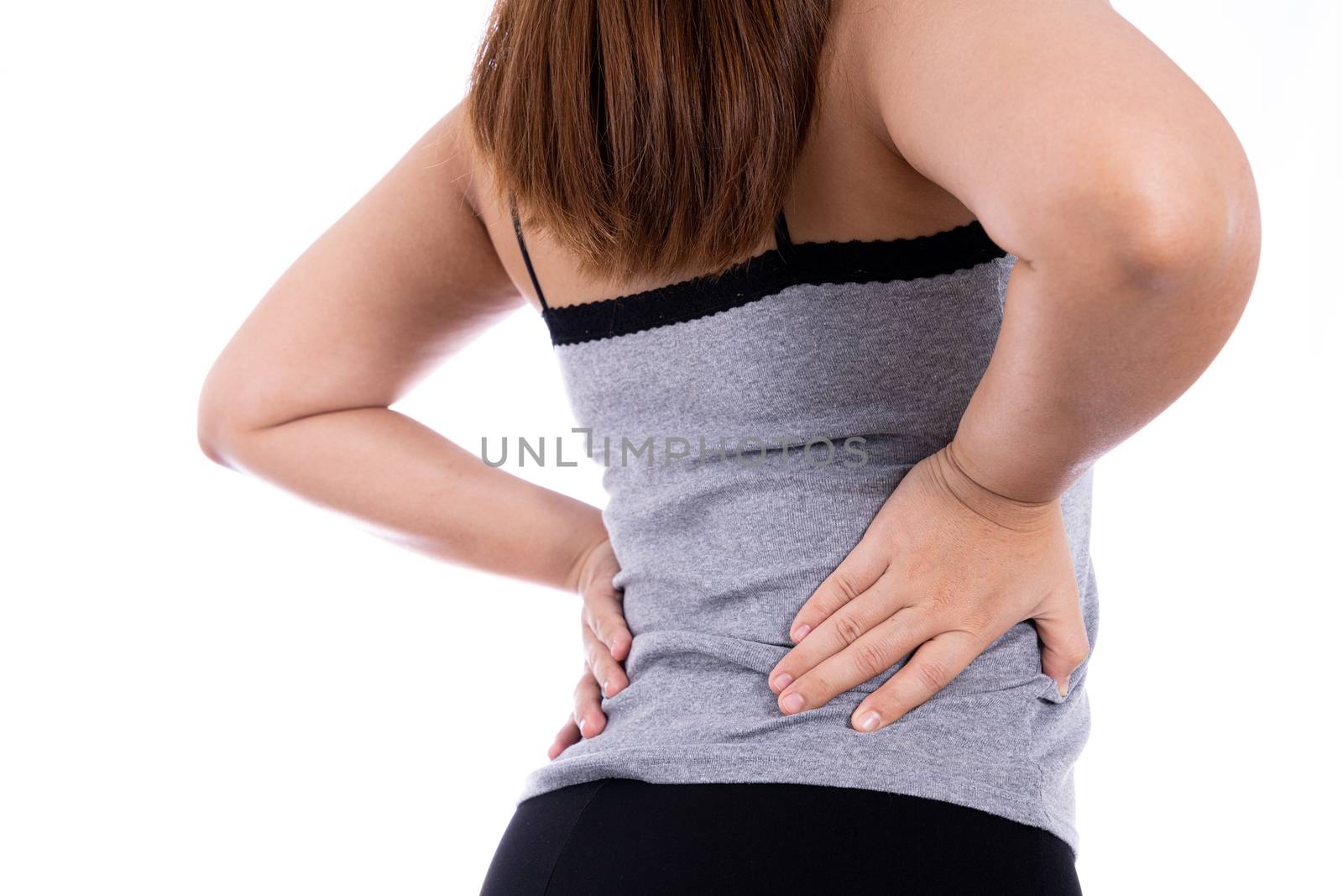 Woman suffering from waist and back pain isolated white background. Health care and medical concept. by mikesaran