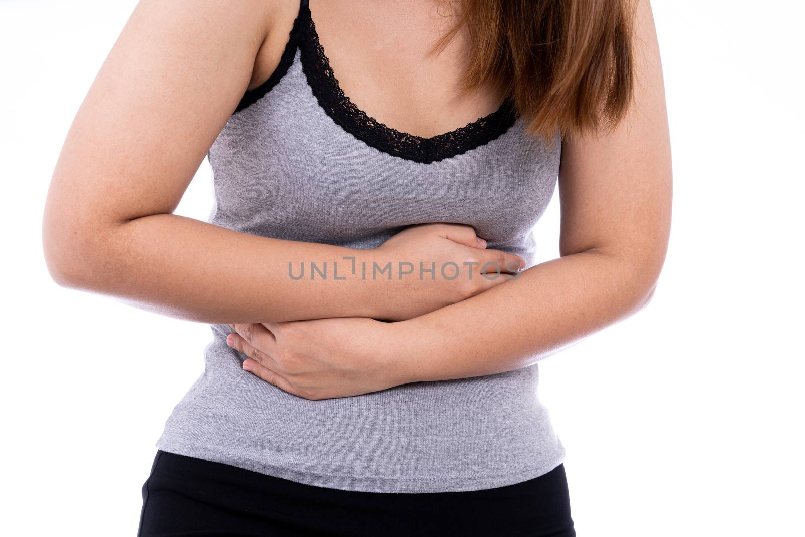 Woman suffering from stomach pain and injury isolated white background. Health care and medical concept.