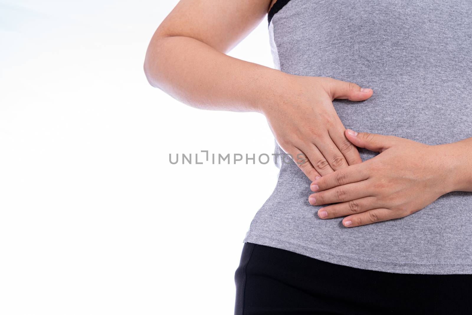 Woman hand touching stomach, waist, or liver position isolated white background. Health care and medical concept.