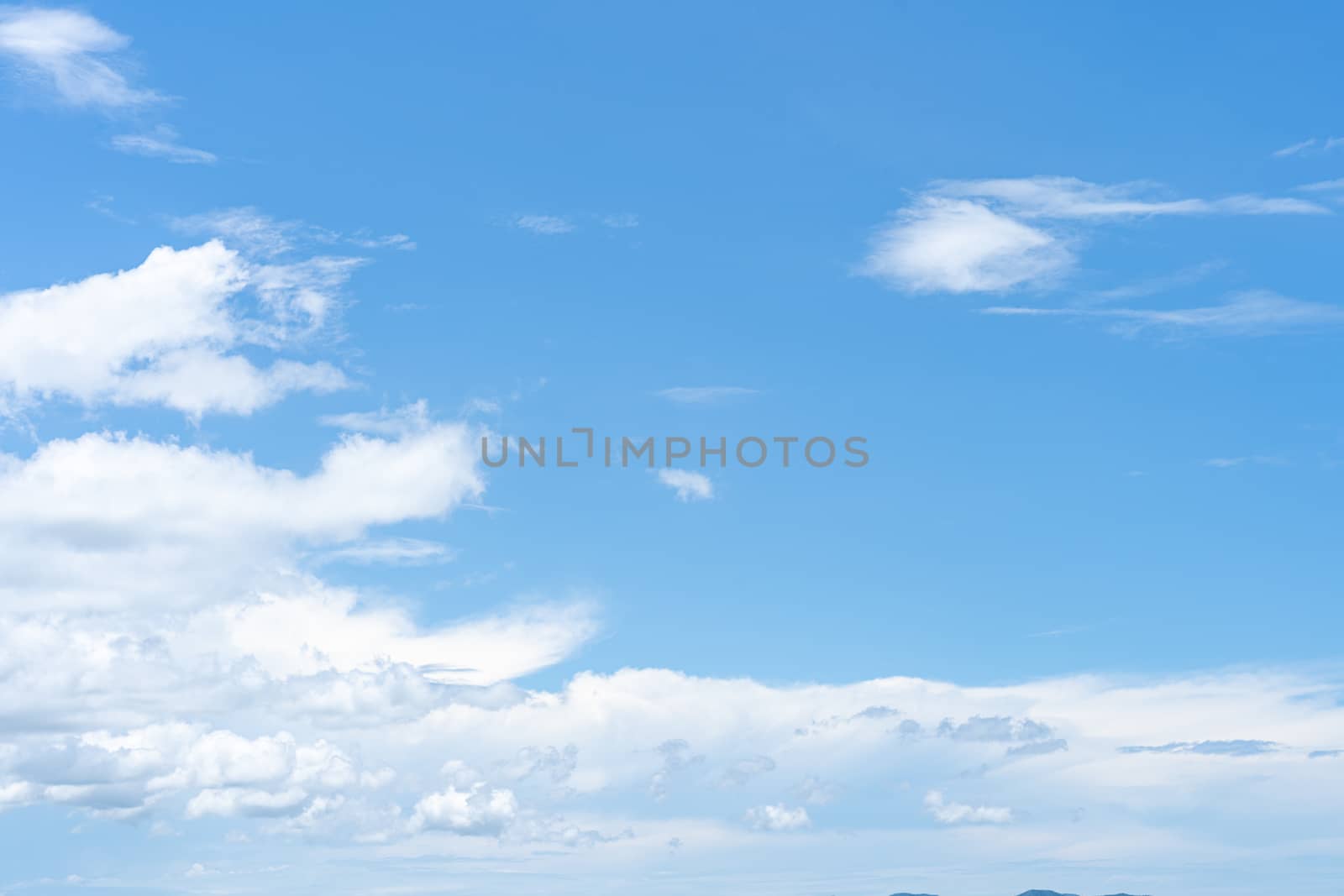 Clear blue sky with white cloud background in the morning. Good weather background.
