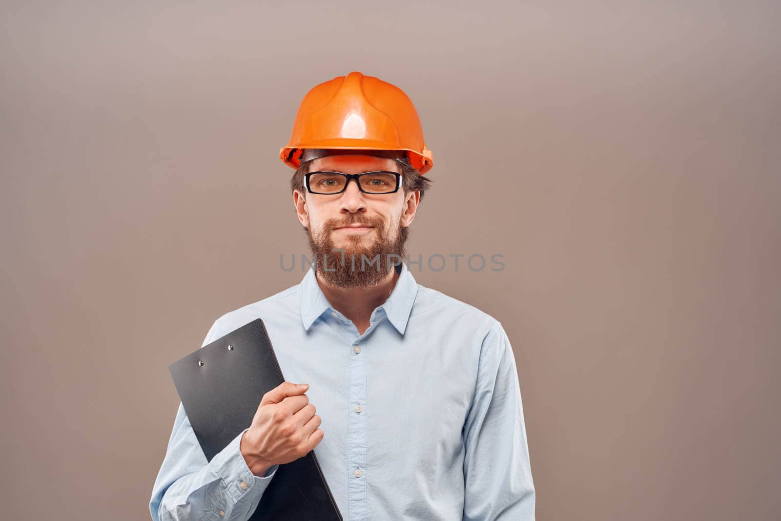 Man in working uniform professional construction lifestyle. High quality photo
