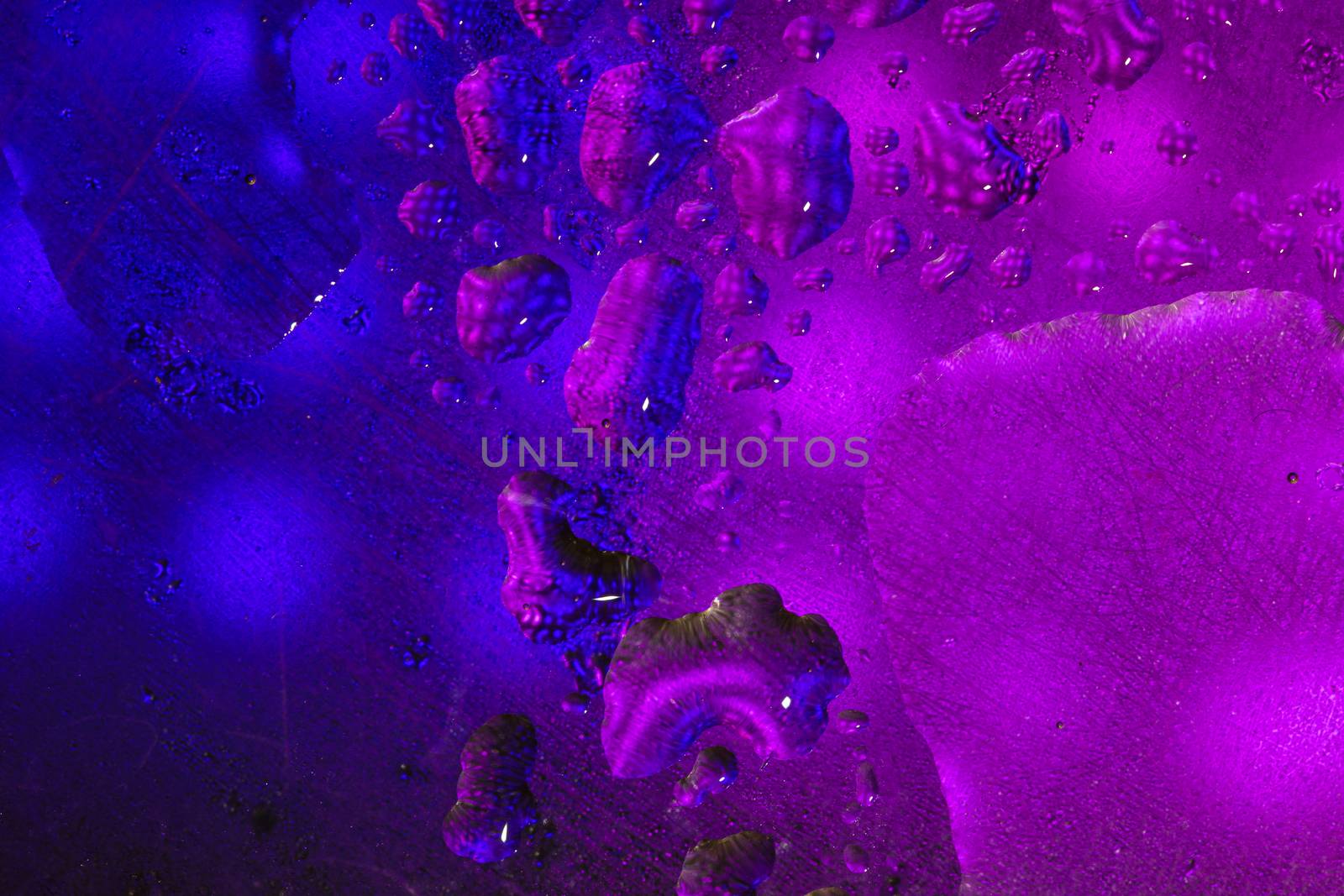 Abstract colorful backdrop or background with water drops on col by vladispas