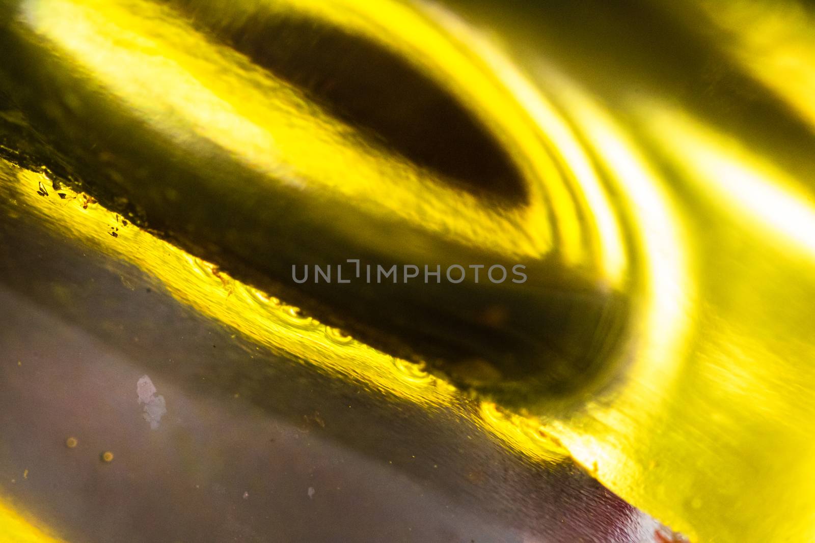 Abstract colorful backdrop with oil drops and waves on water surface. Abstract background concept