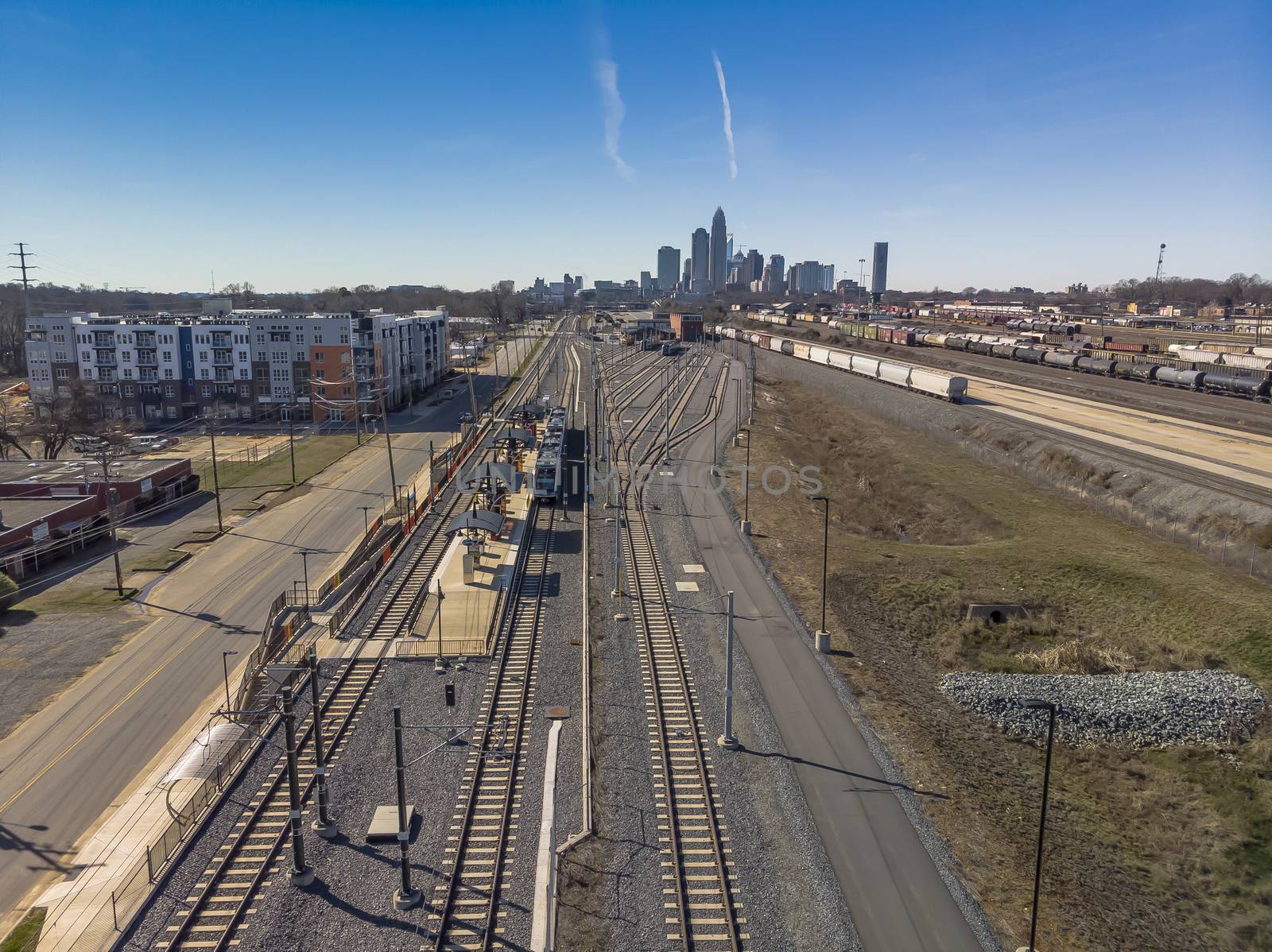 View of a train yard with the city of Charlotte, NC in the background