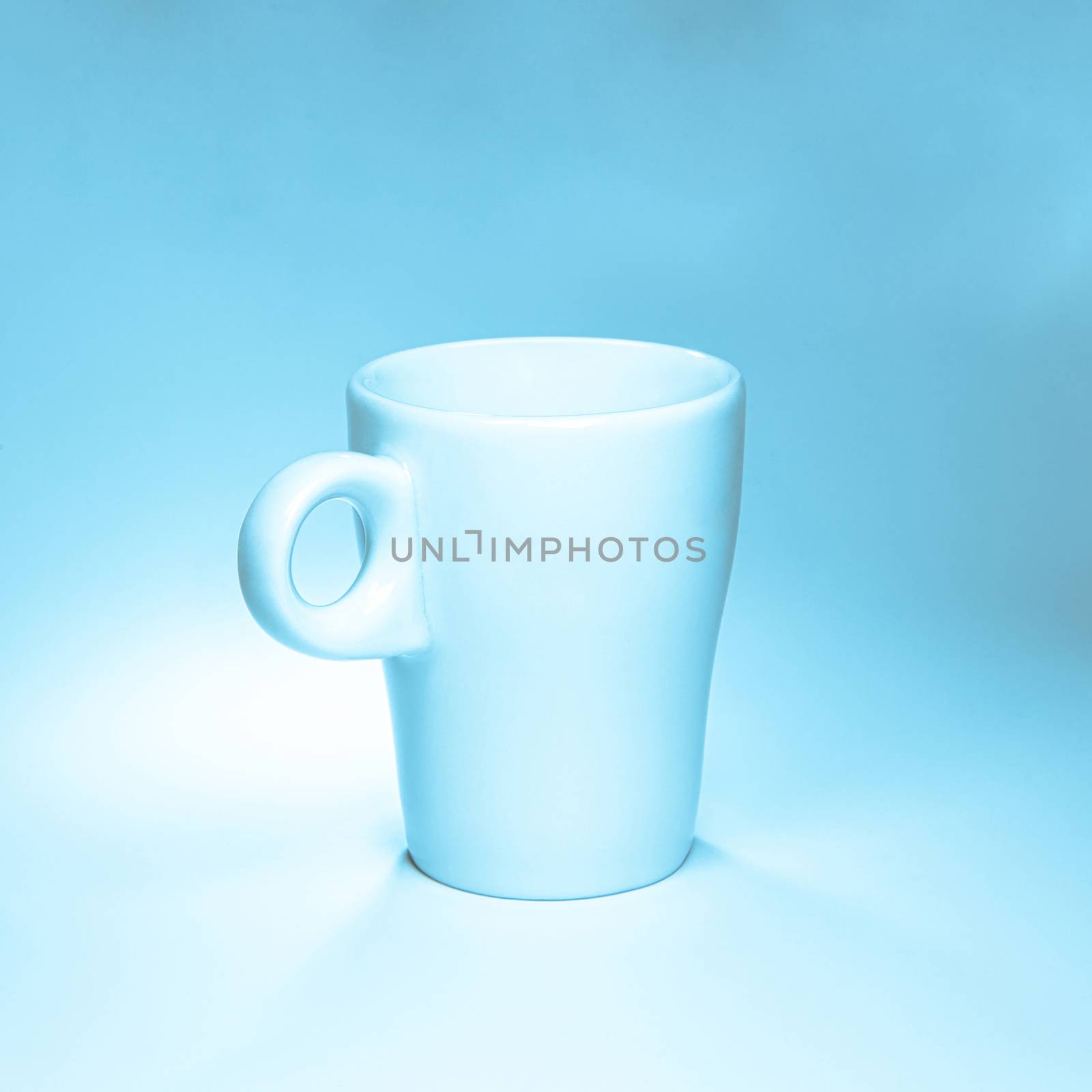 clean luxury coffee cup on blue and white background