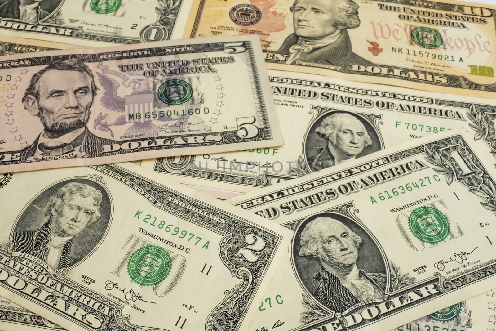 close up USA dollar banknotes by yilmazsavaskandag