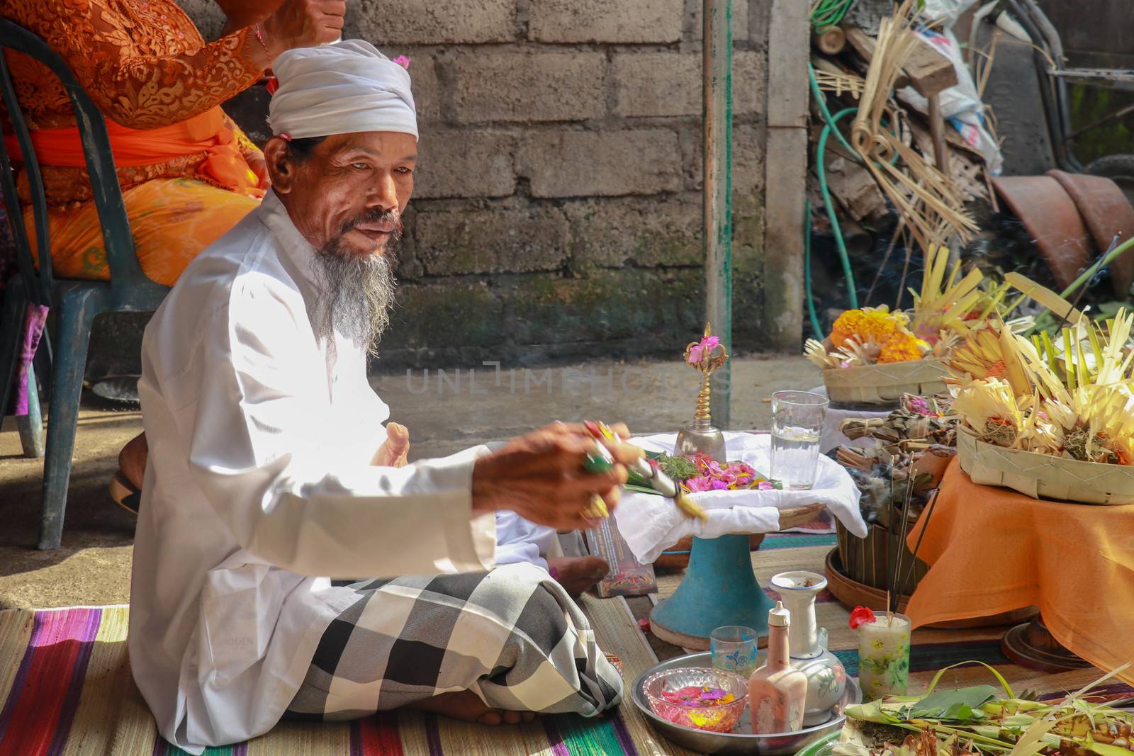 The Hindu Priest or widely known as Pedanda by the Balinese, blessing the ceremony of villas in Nuda dua,Bali.