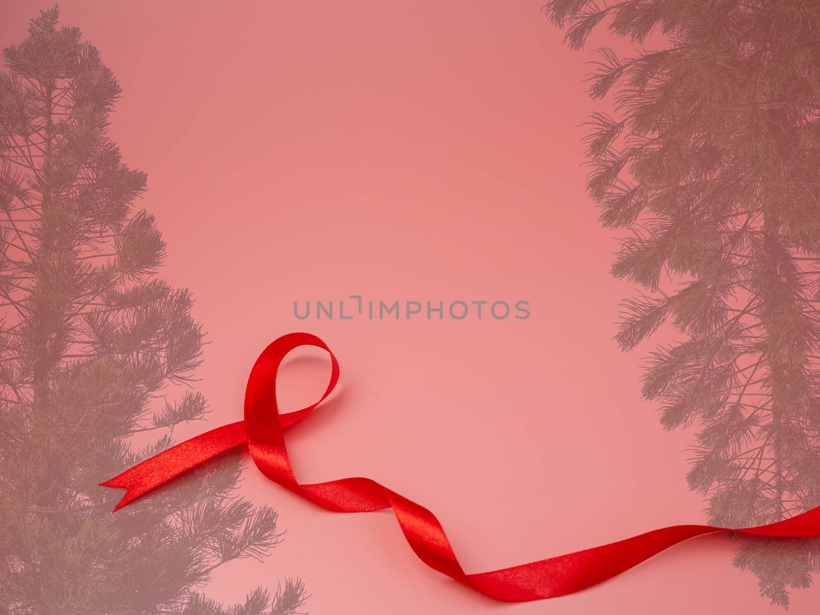 ribbon and christmas tree on Pink christmas background by Unimages2527