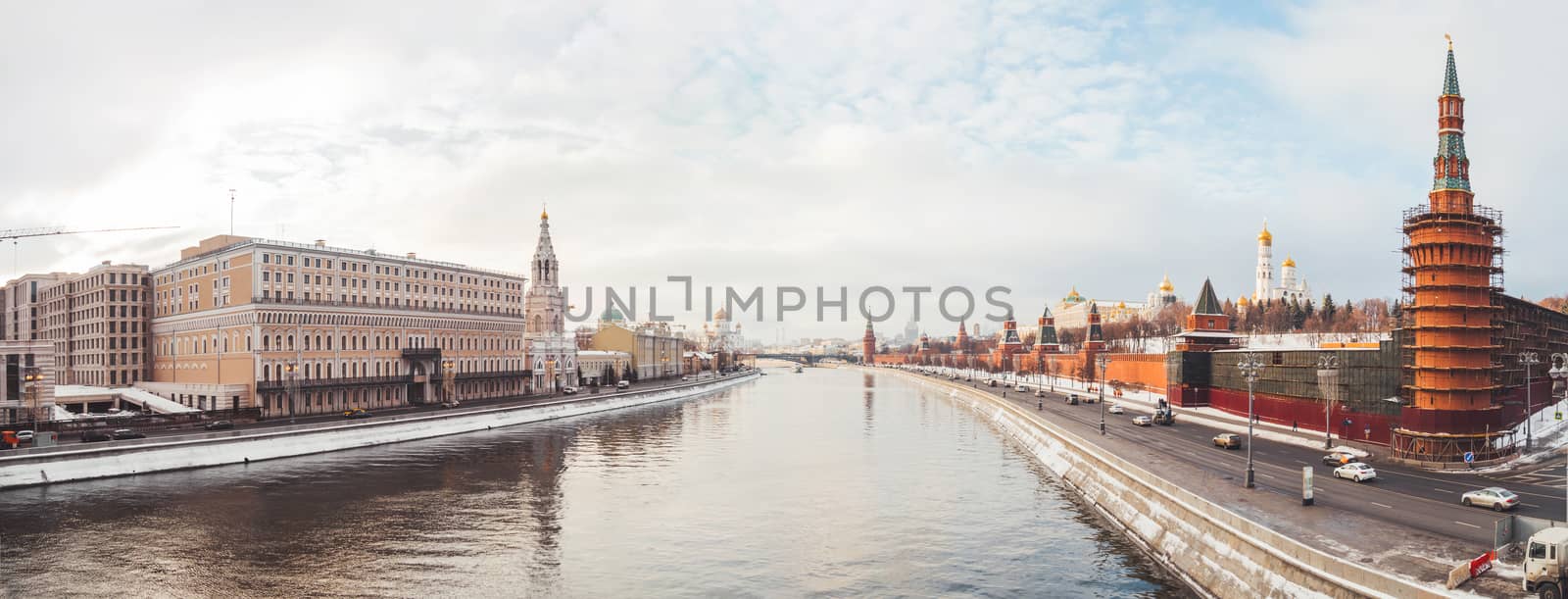 Panorama view of Moscow-river, Kremlin, Ivan the Great Bell tower, Grand Kremlin Palace, Cathedral of the Annunciation. Winter cloudy day in Moscow, Russia.