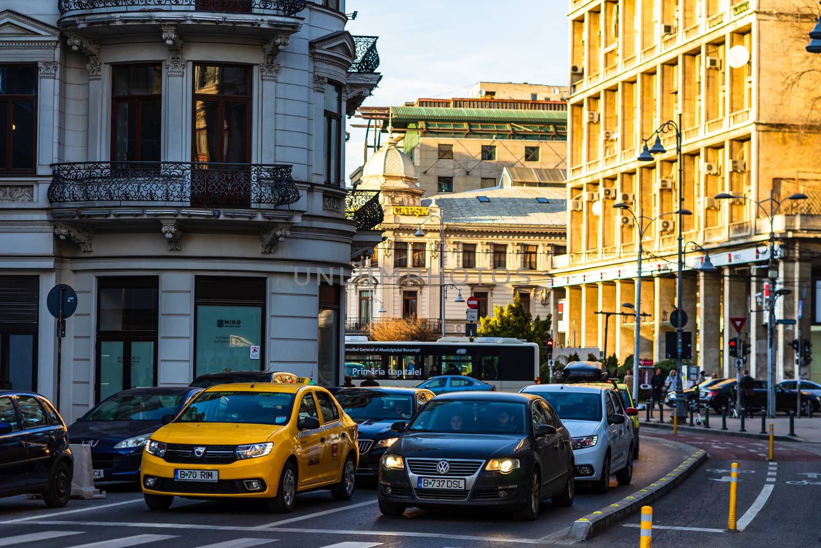 Car traffic at rush hour in downtown area of the city. Car pollution, traffic jam in the morning and evening in the capital city of Bucharest, Romania, 2020