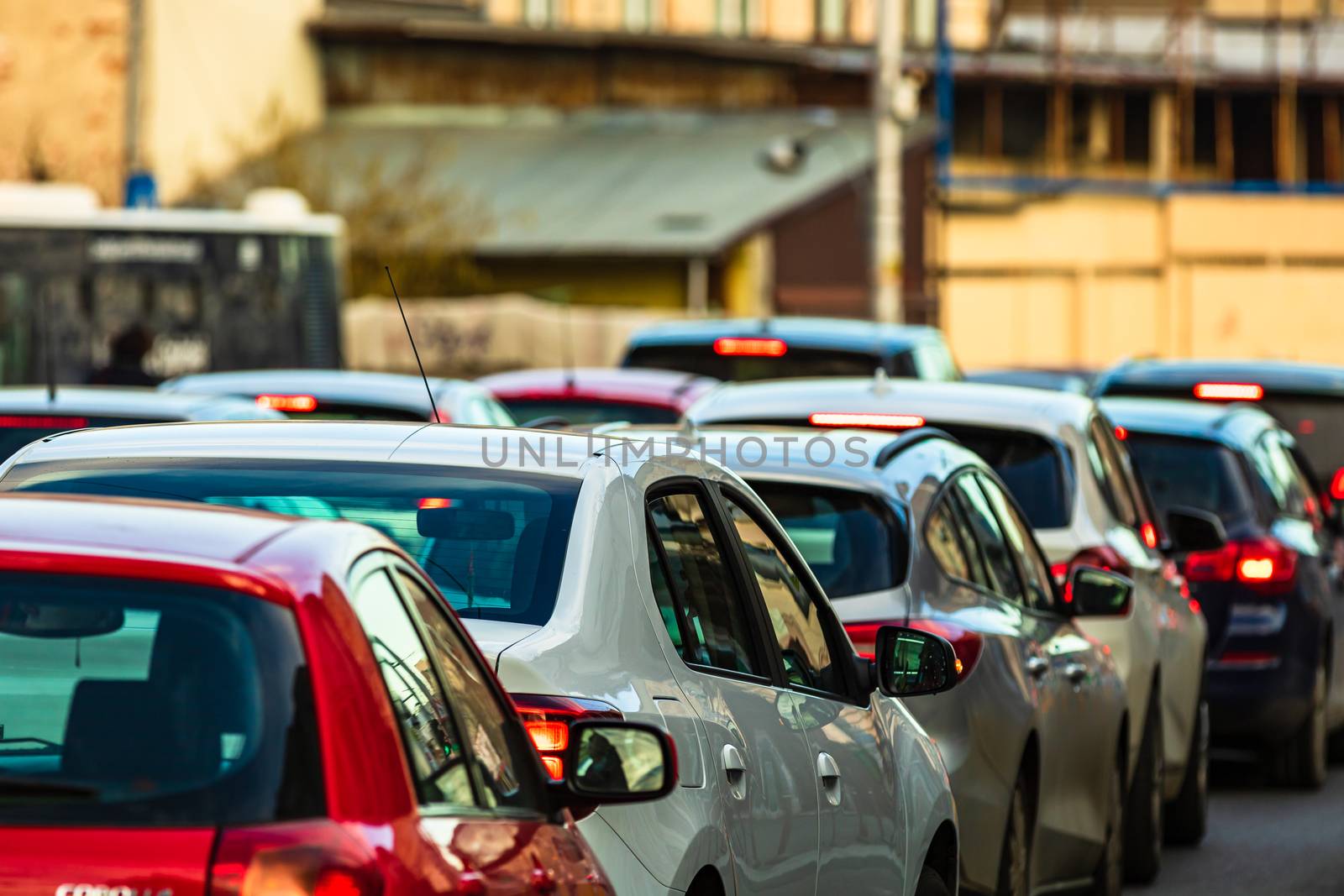 Car traffic at rush hour in downtown area of the city. Car pollution, traffic jam in the morning and evening in the capital city of Bucharest, Romania, 2020