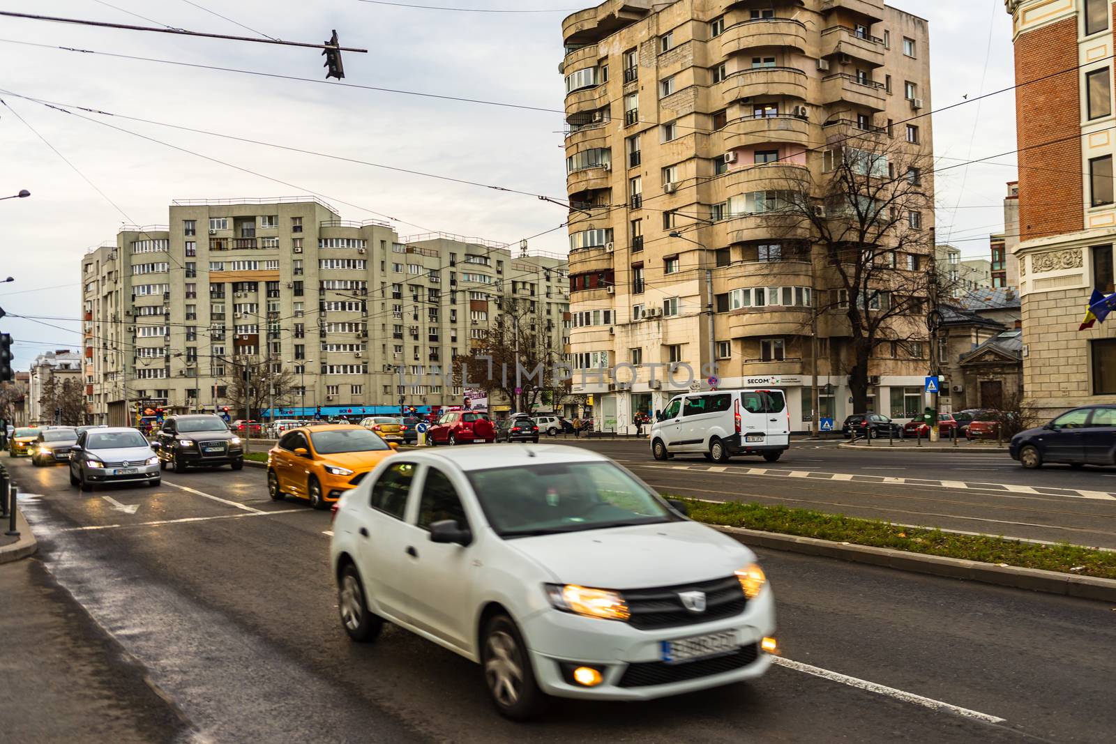 Car traffic at rush hour in downtown area of the city. Car pollution, traffic jam in the morning and evening in the capital city of Bucharest, Romania, 2020