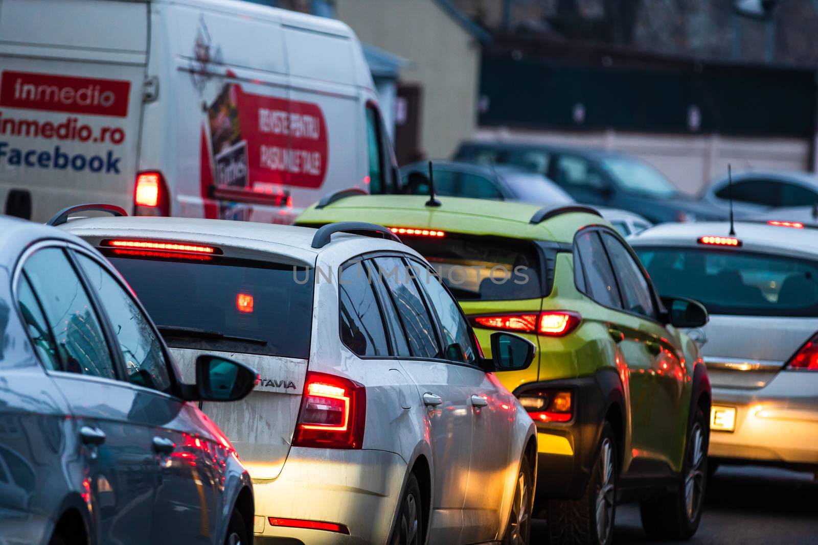 Traffic at rush hour in downtown Bucharest. Junction with stopped cars waiting for green light in Bucharest, Romania, 2020