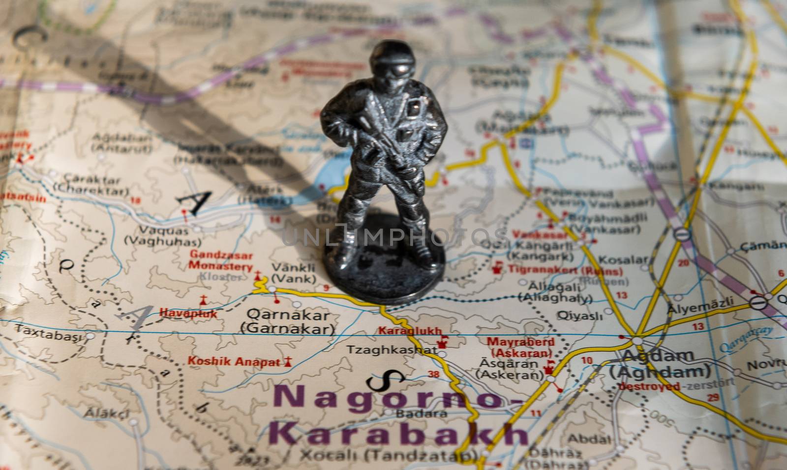 A figurine of an armed soldier on the map of Nagorno-Karabakh.