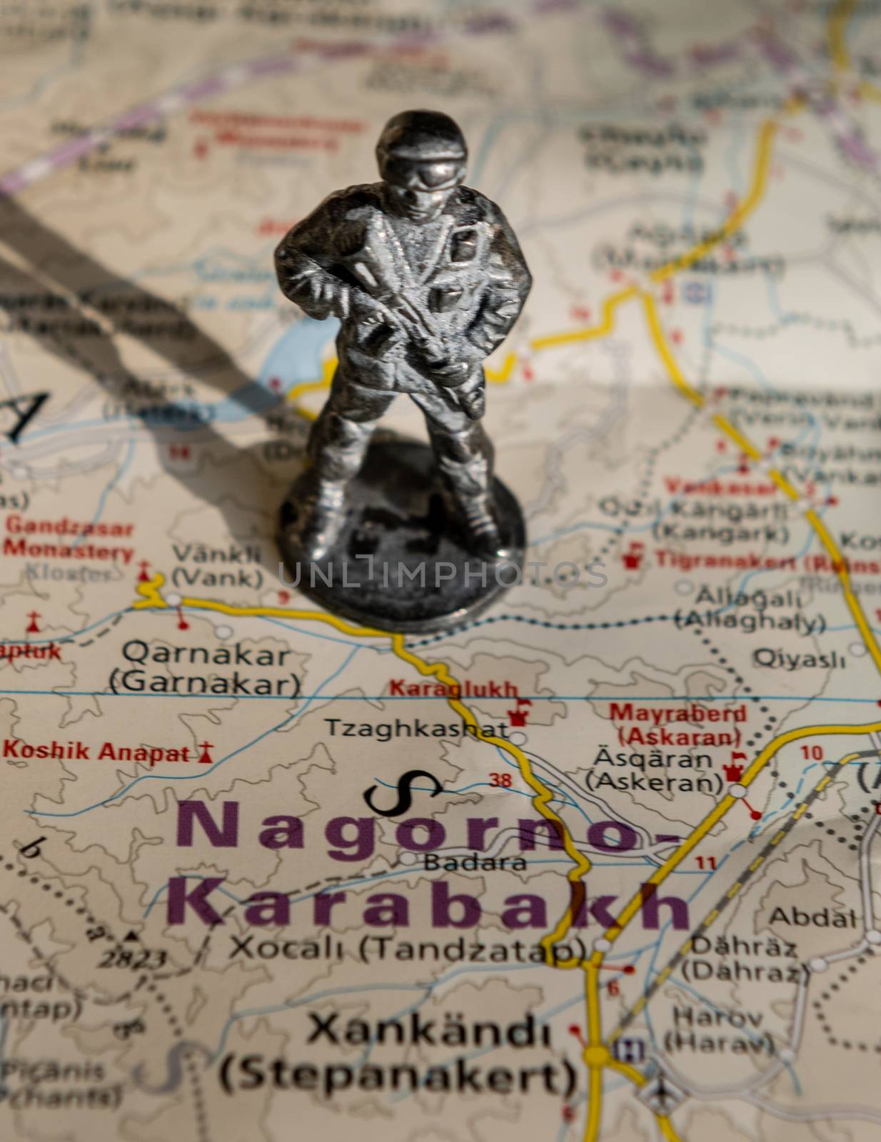 A figurine of an armed soldier on the map of Nagorno-Karabakh.