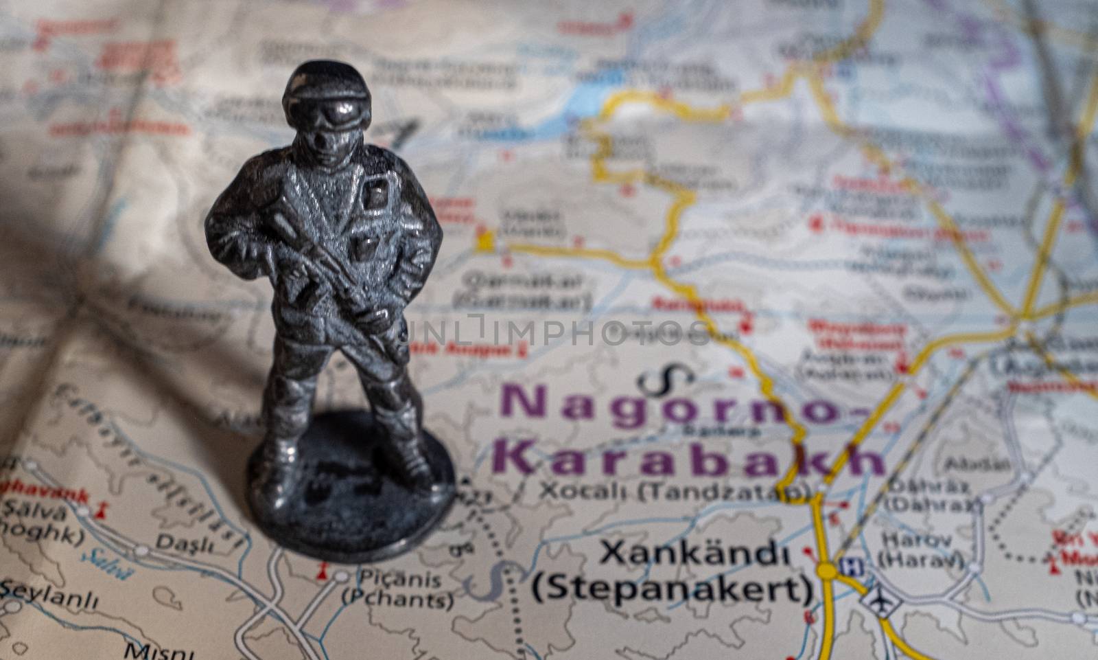 A figurine of an armed soldier on the map of Nagorno-Karabakh.