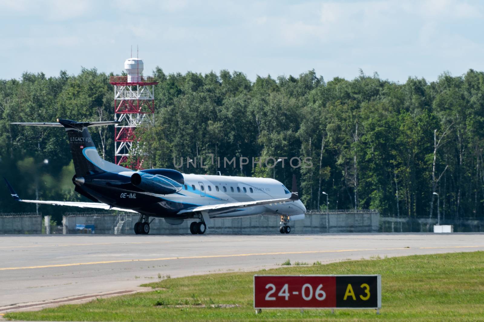 July 2, 2019, Moscow, Russia. Airplane Embraer ERJ-135 Avcon Jet at Vnukovo airport in Moscow.