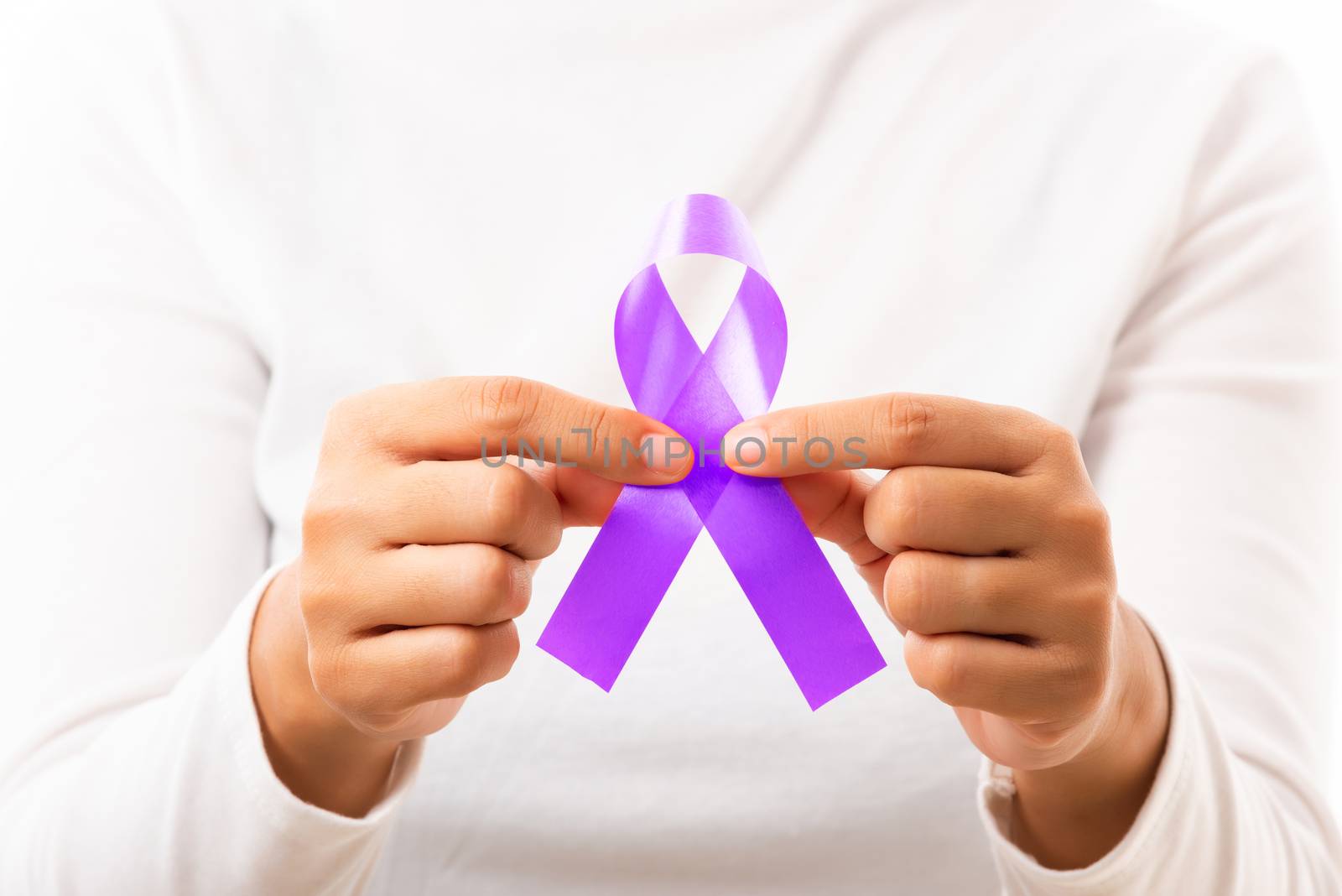 National Epilepsy or Alzheimer disease Day. Young woman holding purple ribbon on hand symbol of Pancreatic cancer, Epilepsy awareness and world Lupus Day and world cancer isolated white background