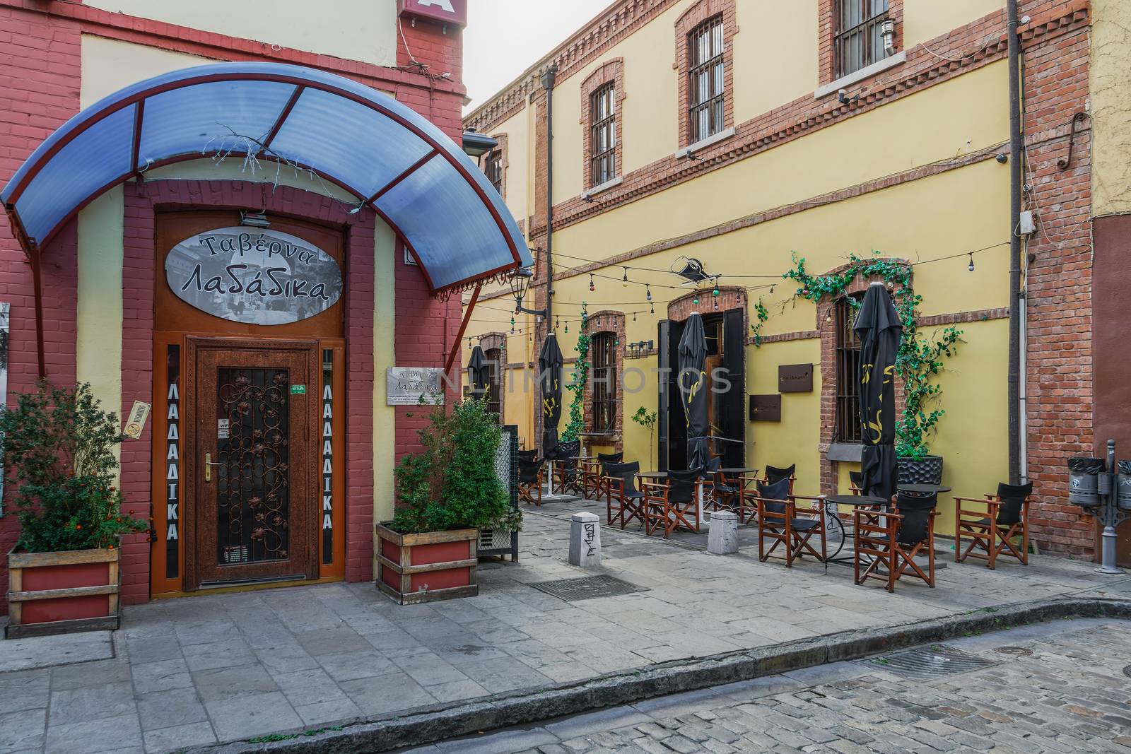 Day view of closed restaurant at Ladadika area, due to lockdown covid-19 measures.