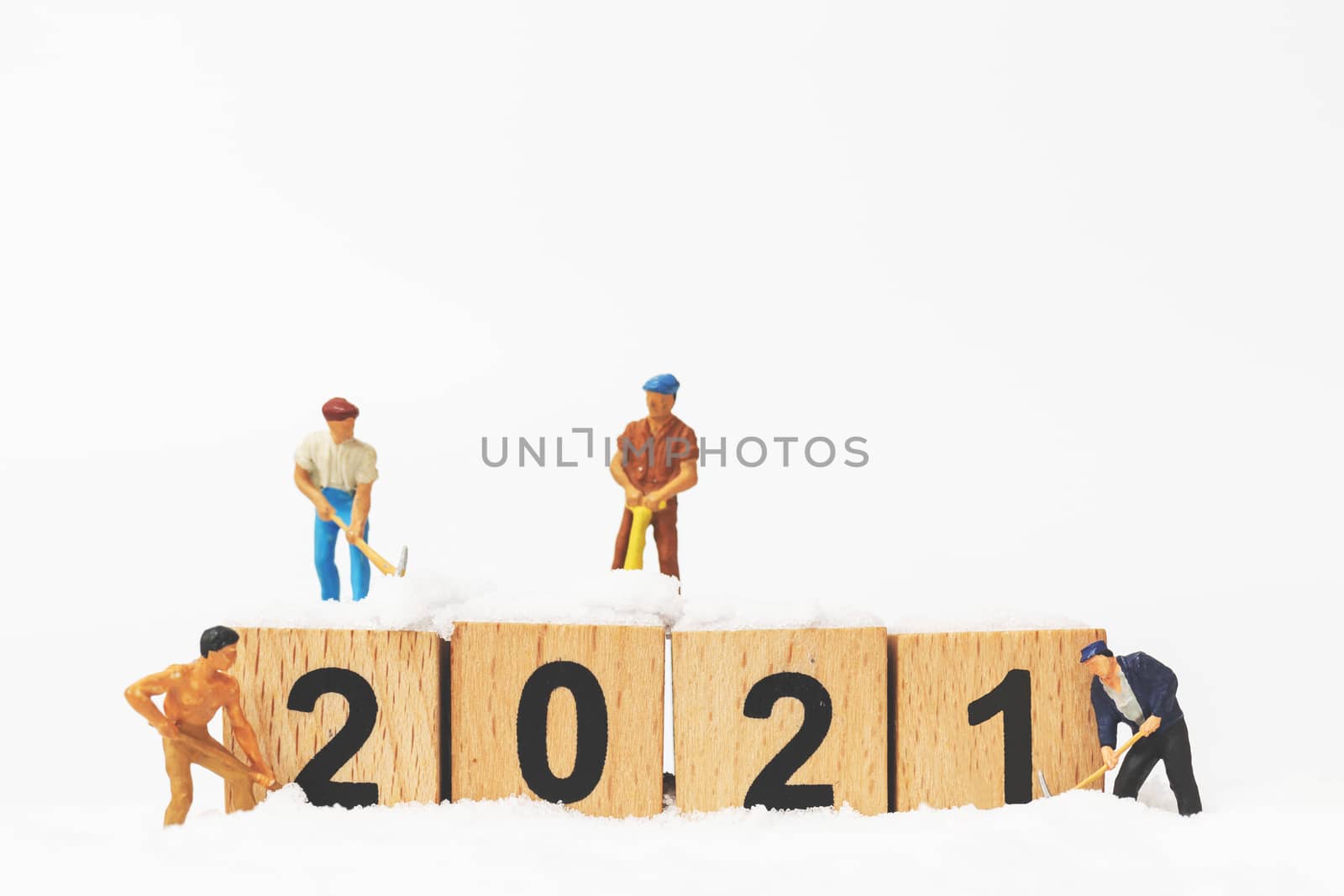 Miniature people : Worker team create wooden block number 2021 by sirichaiyaymicro