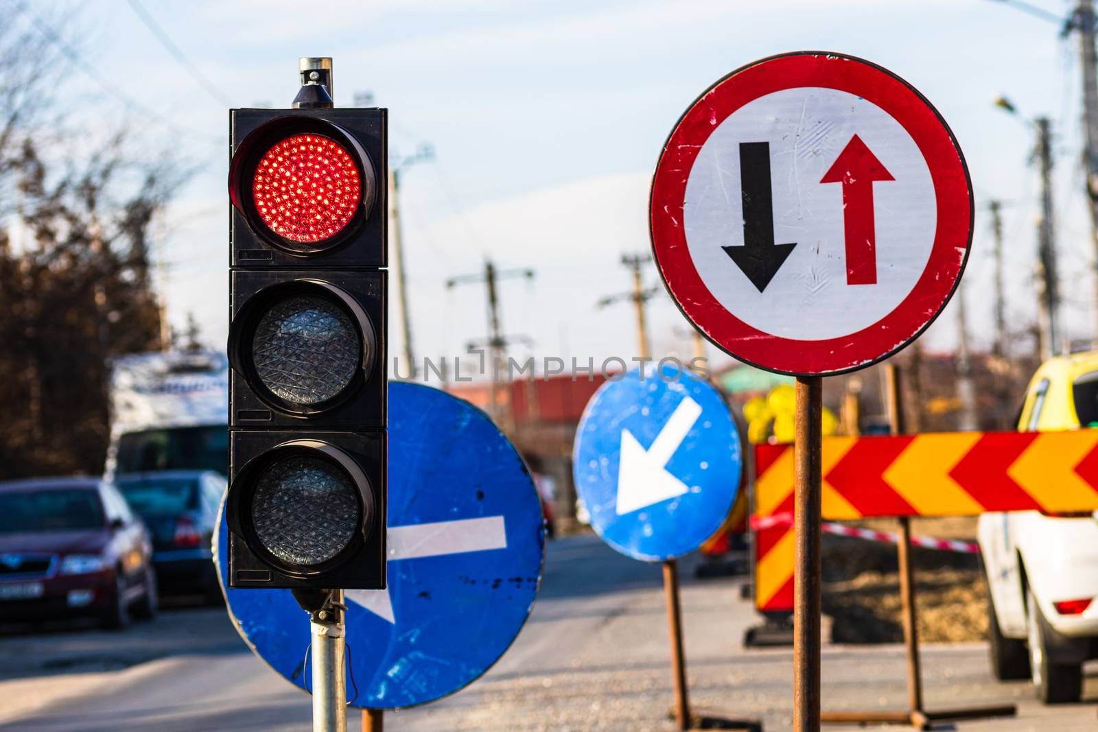 Traffic light with red light. Traffic light signal semaphore located in a working area in Bucharest, Romania, 2020