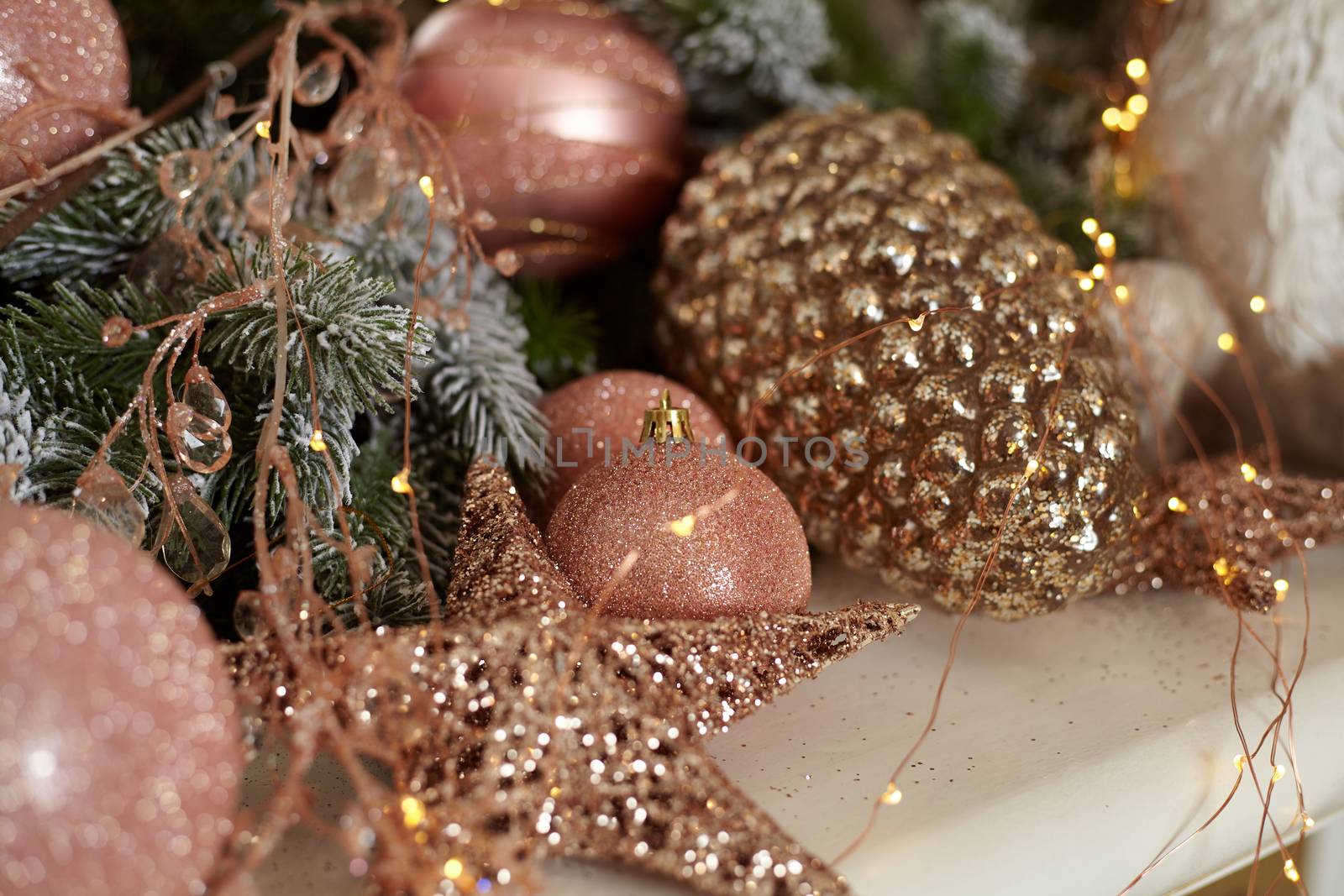 Christmas tree blur garland close-up New year background Decoration with snow and branch of Christmas tree