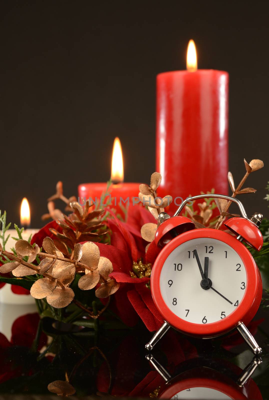A festive scene with an alarm clock for the Christmas season.