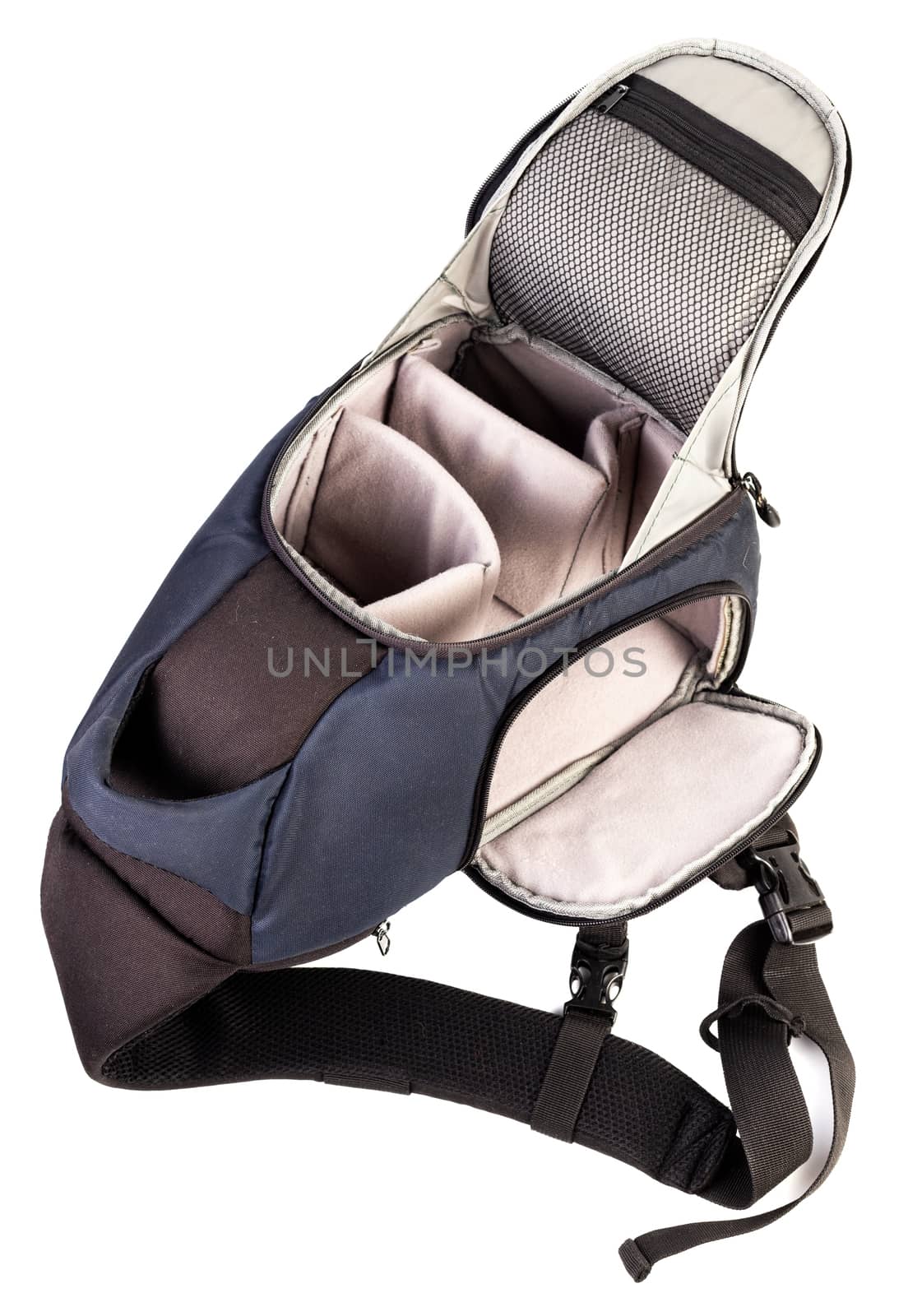 Used black and blue fabric camera bag isolated on white background.
