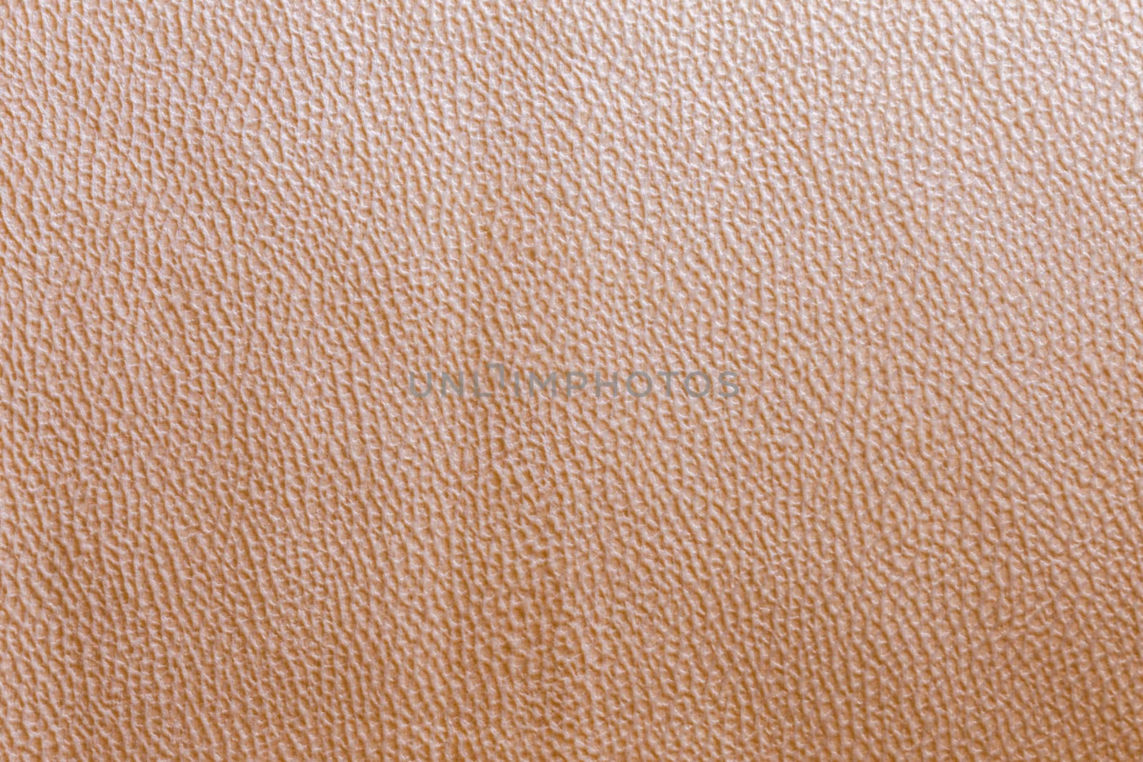 non-voven furniture upholstery beige texture and background with small concavities random pattern