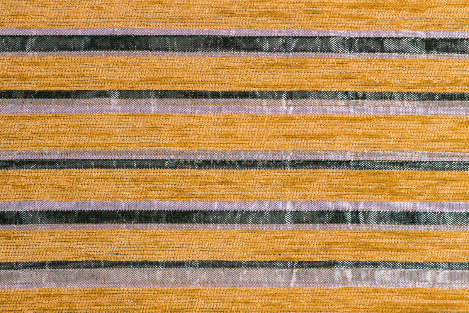 orange striped synthetic woven upholstery fabric close-up texture and background