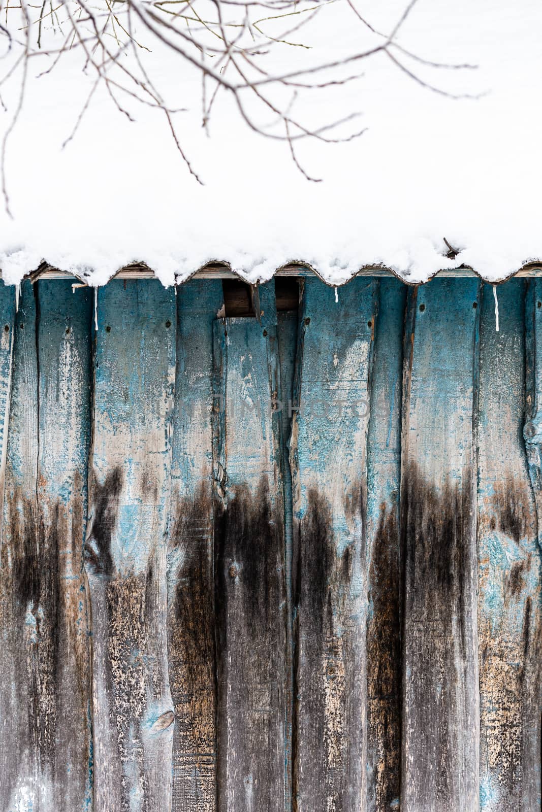 old wooden barn planks wall winter texture and background with selective focus.