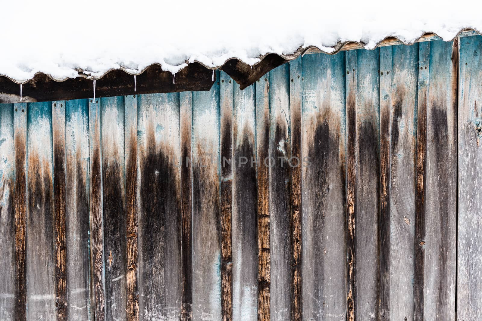 old wooden barn planks wall winter texture and background.