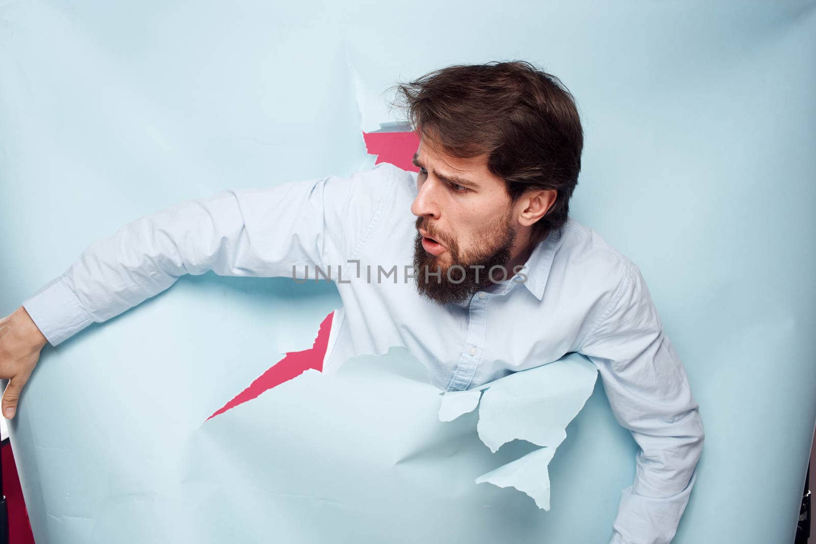 Man in shirt over wall emotions lifestyle fun office corporate party. High quality photo