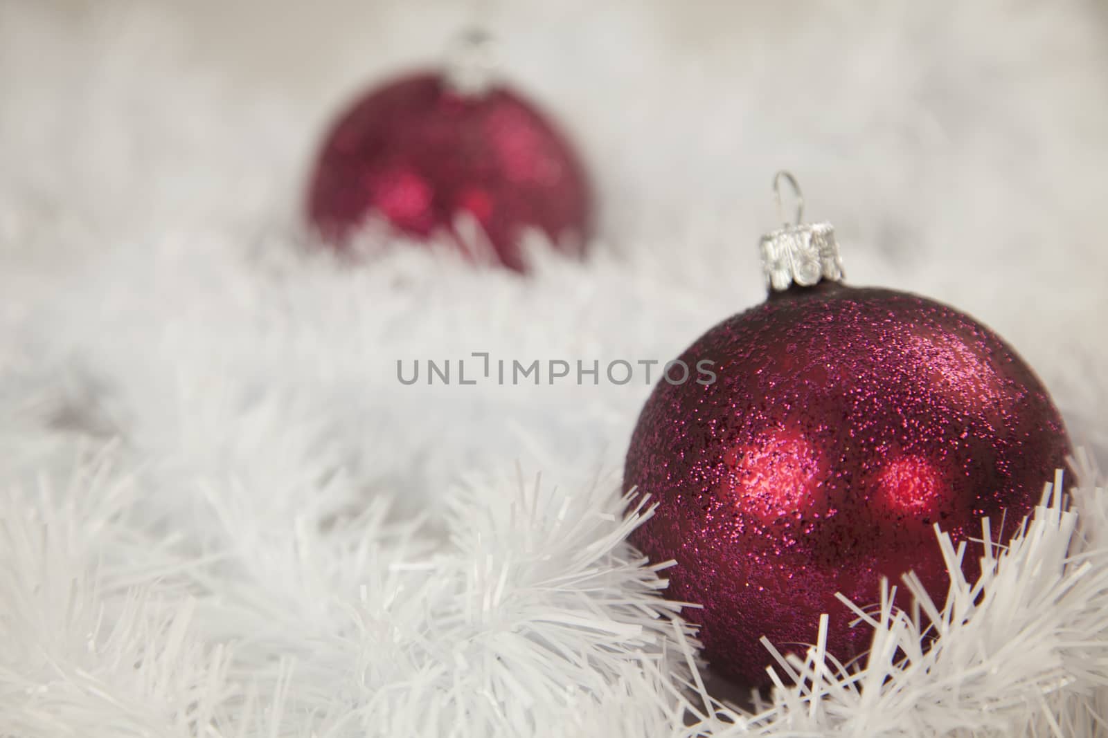 Red baubles Christmas decoration in white fluffy background